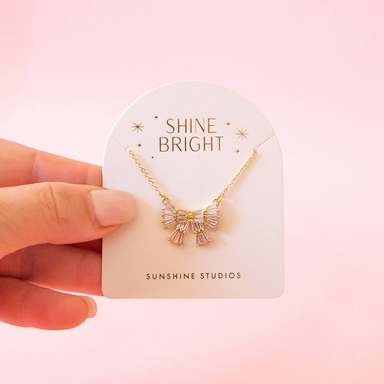 Sunshine Studios Holiday Sparkle Bow Necklace Accessories - Jewelry - Necklaces by Sunshine Studios | Grace the Boutique